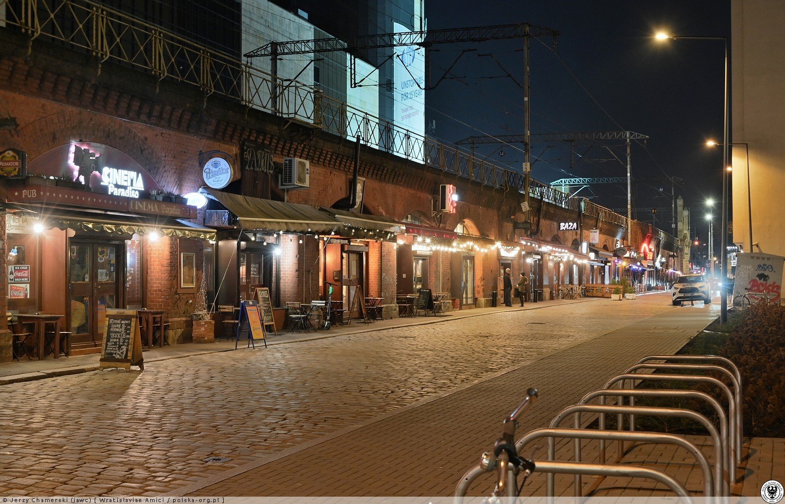 a night photo of boguslawskiego street Bogusławskiego street, home to many cheap bars in Wrocław.