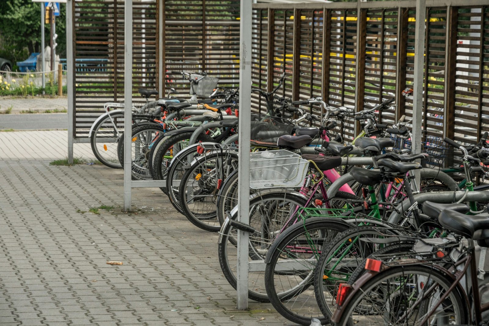 A bike rack in Wroclaw filled with bicycles, highlighting the accessibility and popularity of cycling as an eco-friendly and affordable transport option for anyone living on a Wroclaw on a Budget.